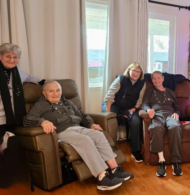 Resident relaxing comfortably in a shared living space